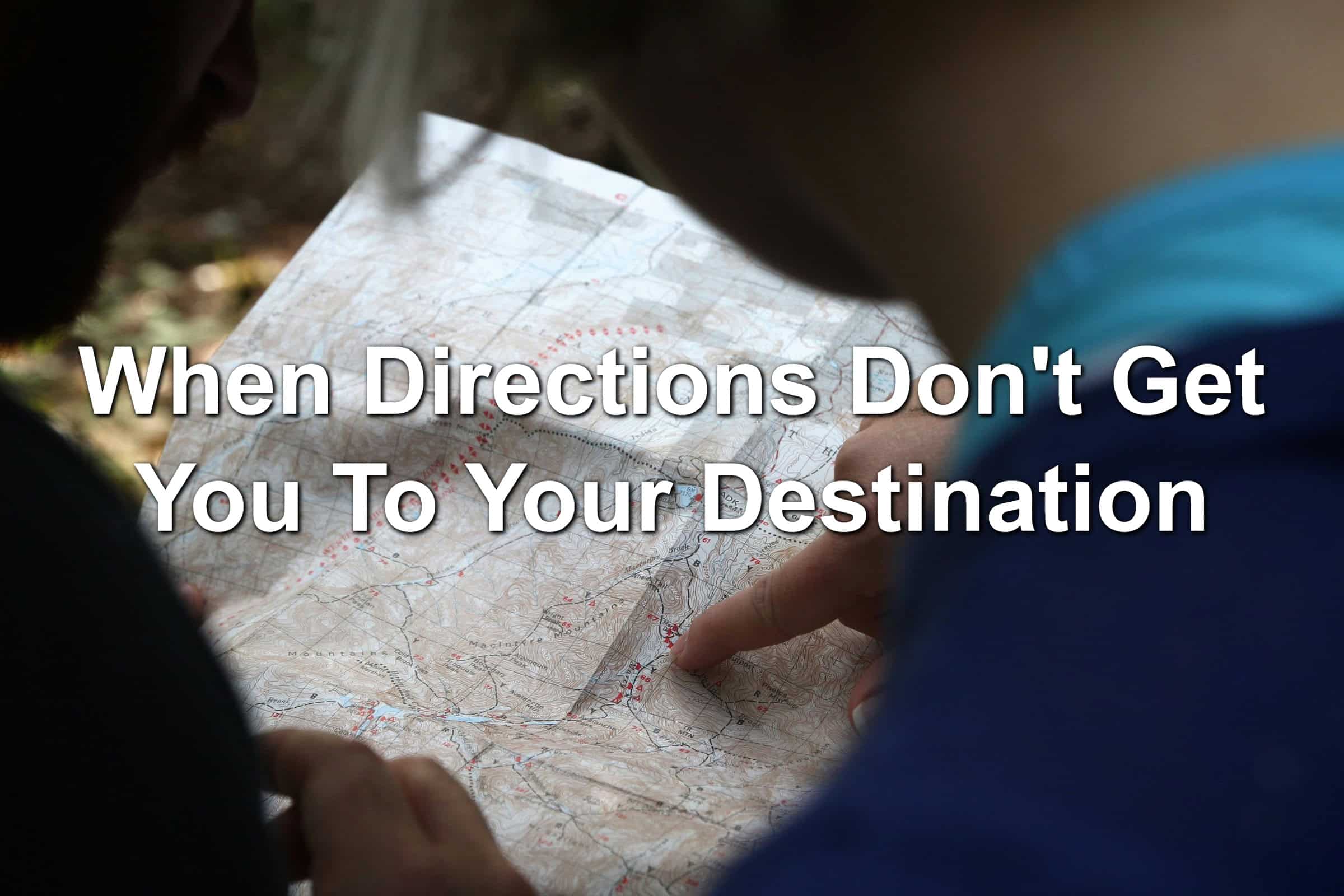 Person pointing out a destination on a map