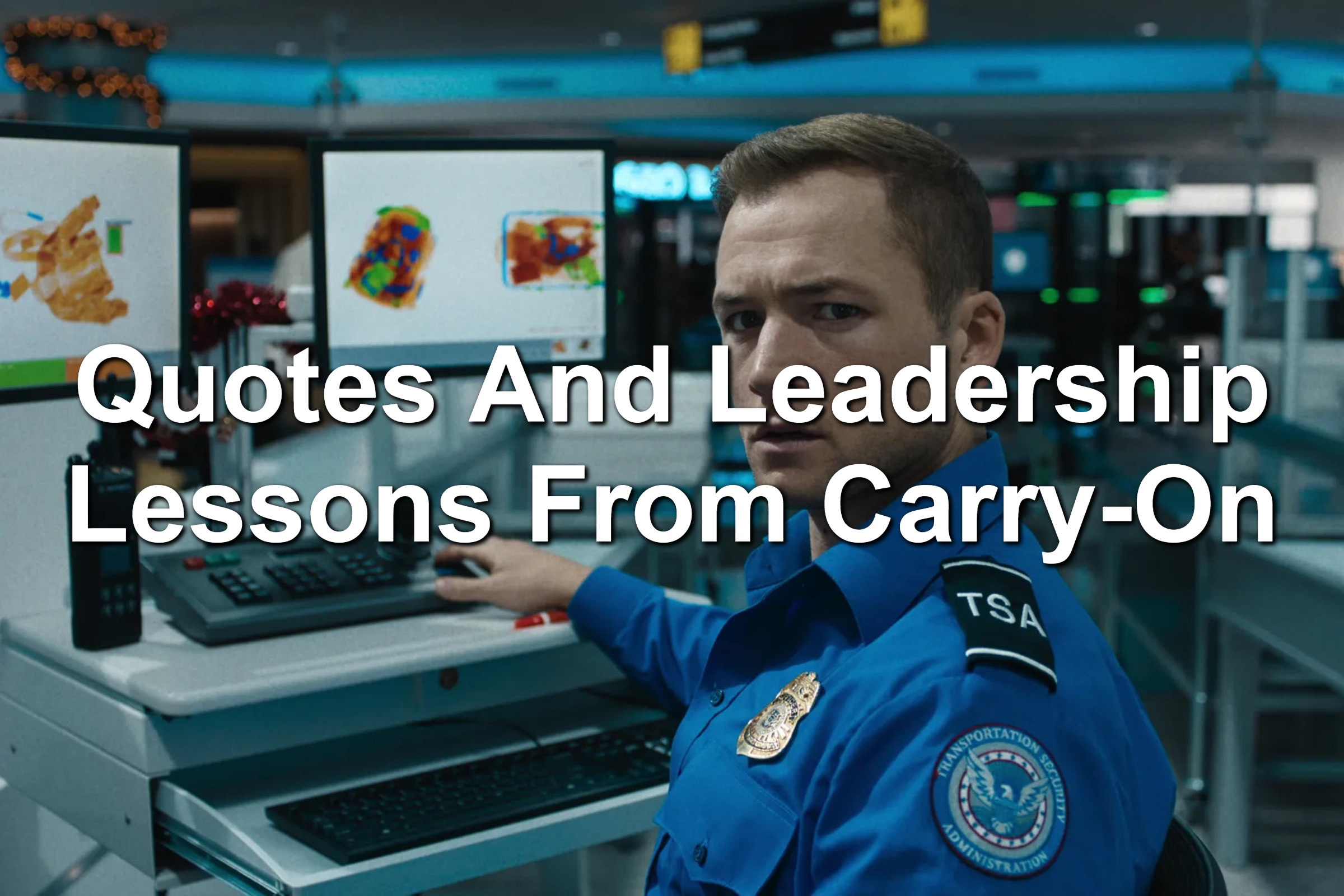 Taron Egerton dressed in a blue TSA uniform. Pointing at a computer screen in the airport.