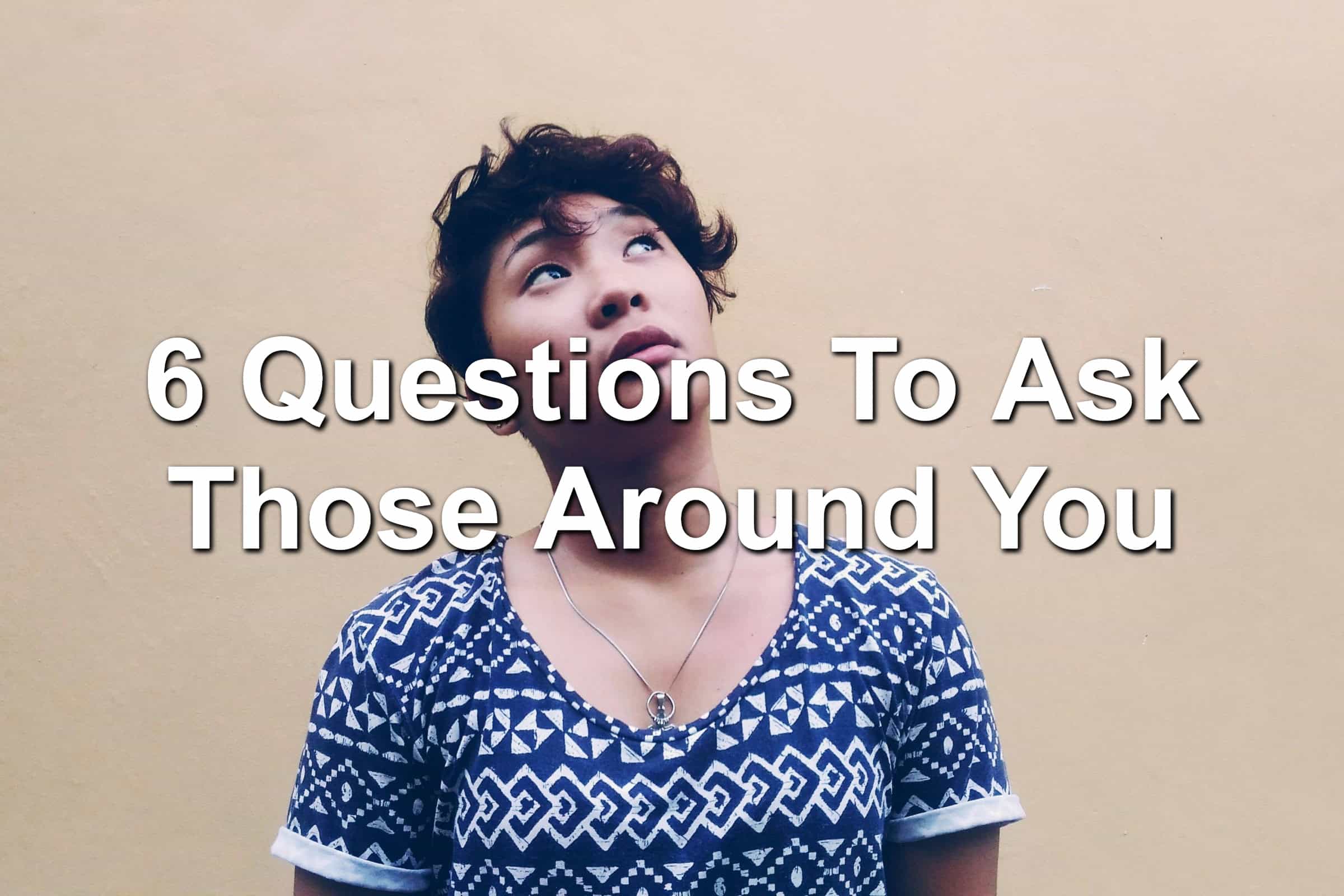Woman looking up, has a quizzical look on her face