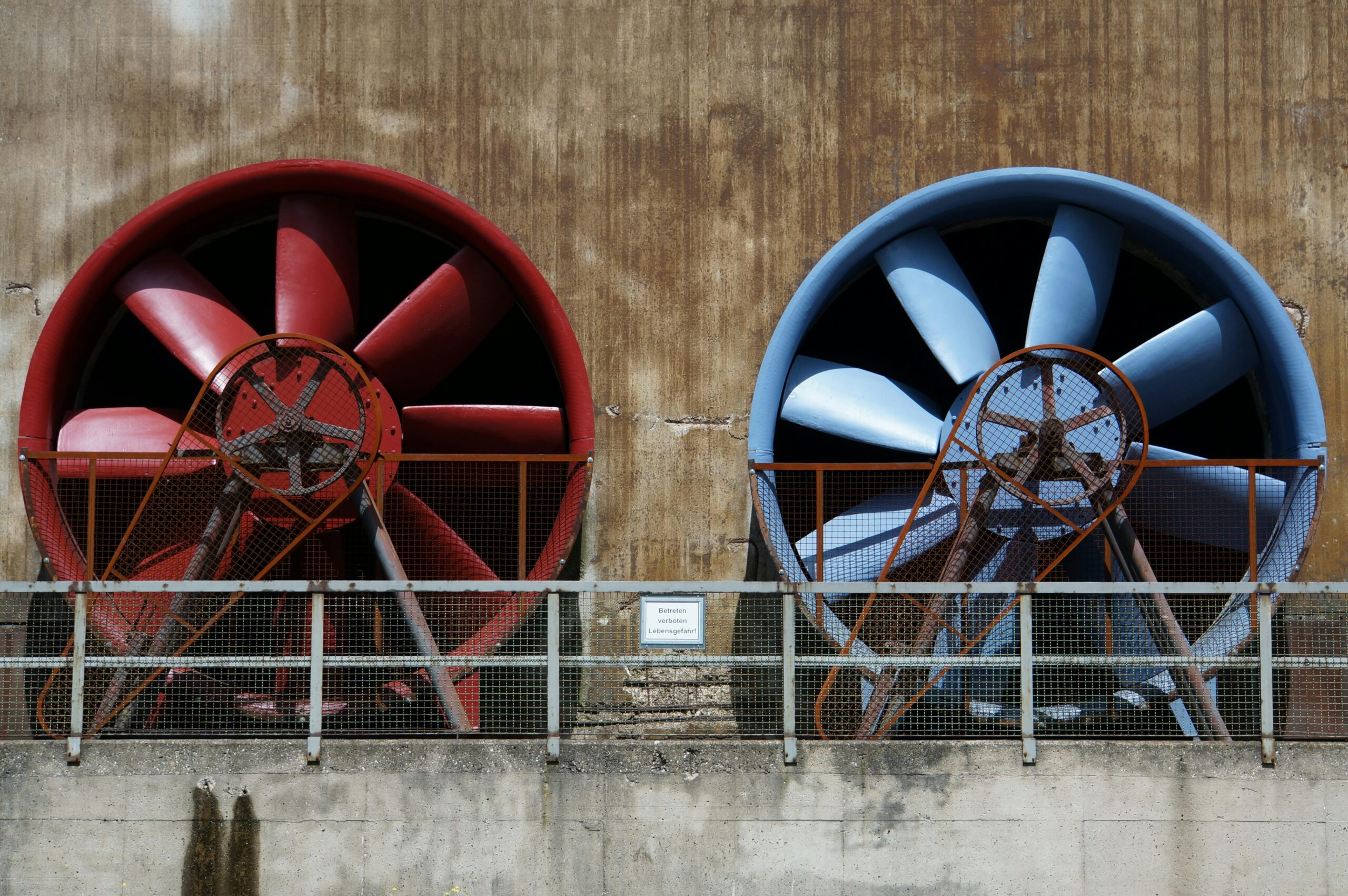 Red and blue industrial fans