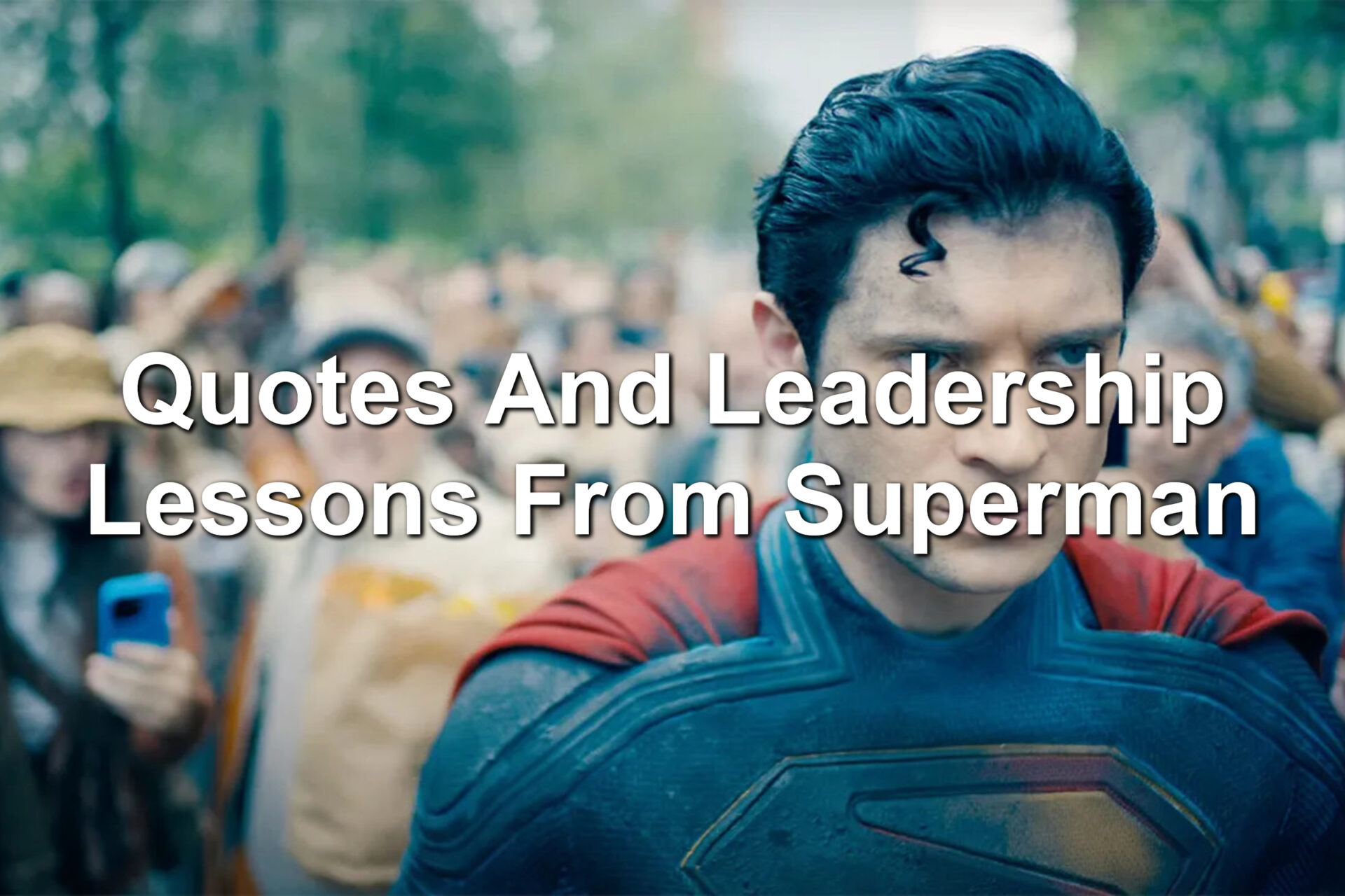 Superman: A man in a red and blue suit. He has a stern look on his face.