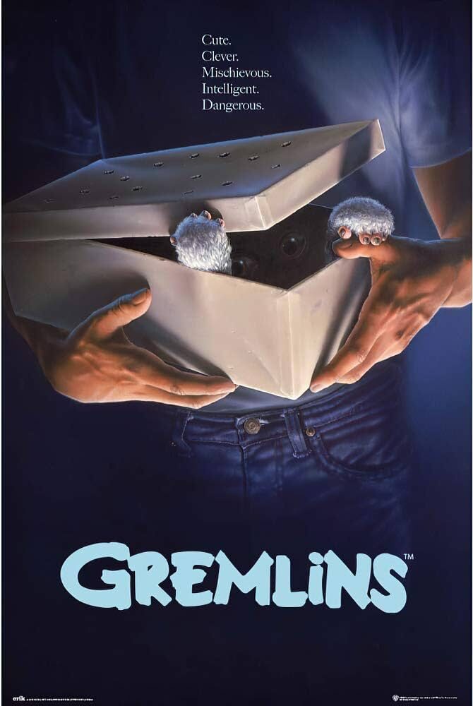 Person holding a white box. Two little white, furry paws are just under the lid. The original movie poster for the movie Gremlins.