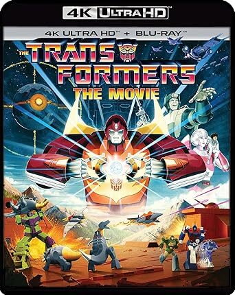 The cover to the Transformers The Movie Blu Ray. A red Transformer is opening the Matrix Of Leadership.