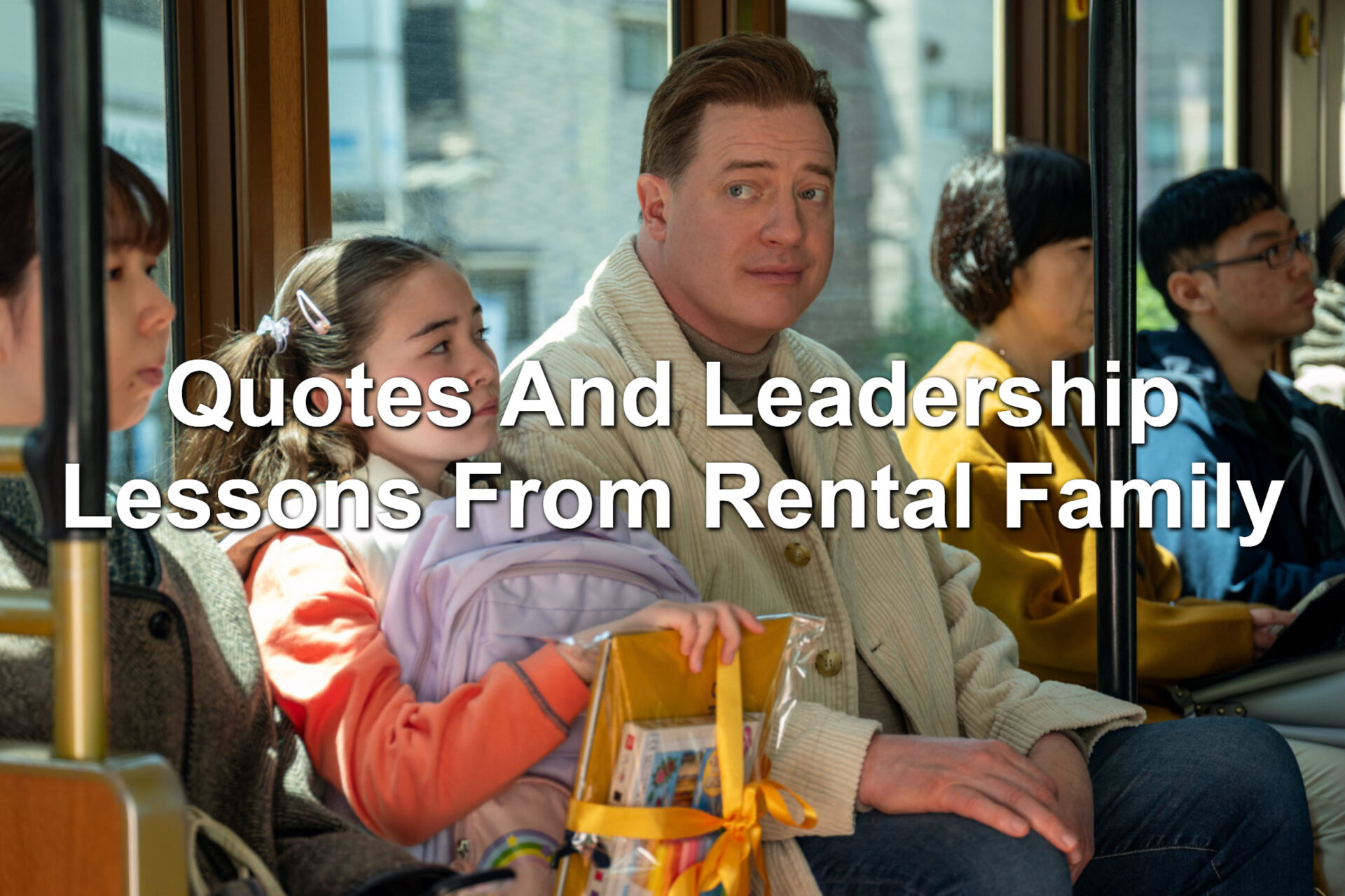 A man and a young girl sitting on a bus together.