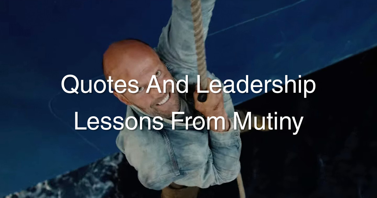 Man in a jean jacket holding onto a shipping rope for dear life. Jason Statham in a scene from the movie Mutiny